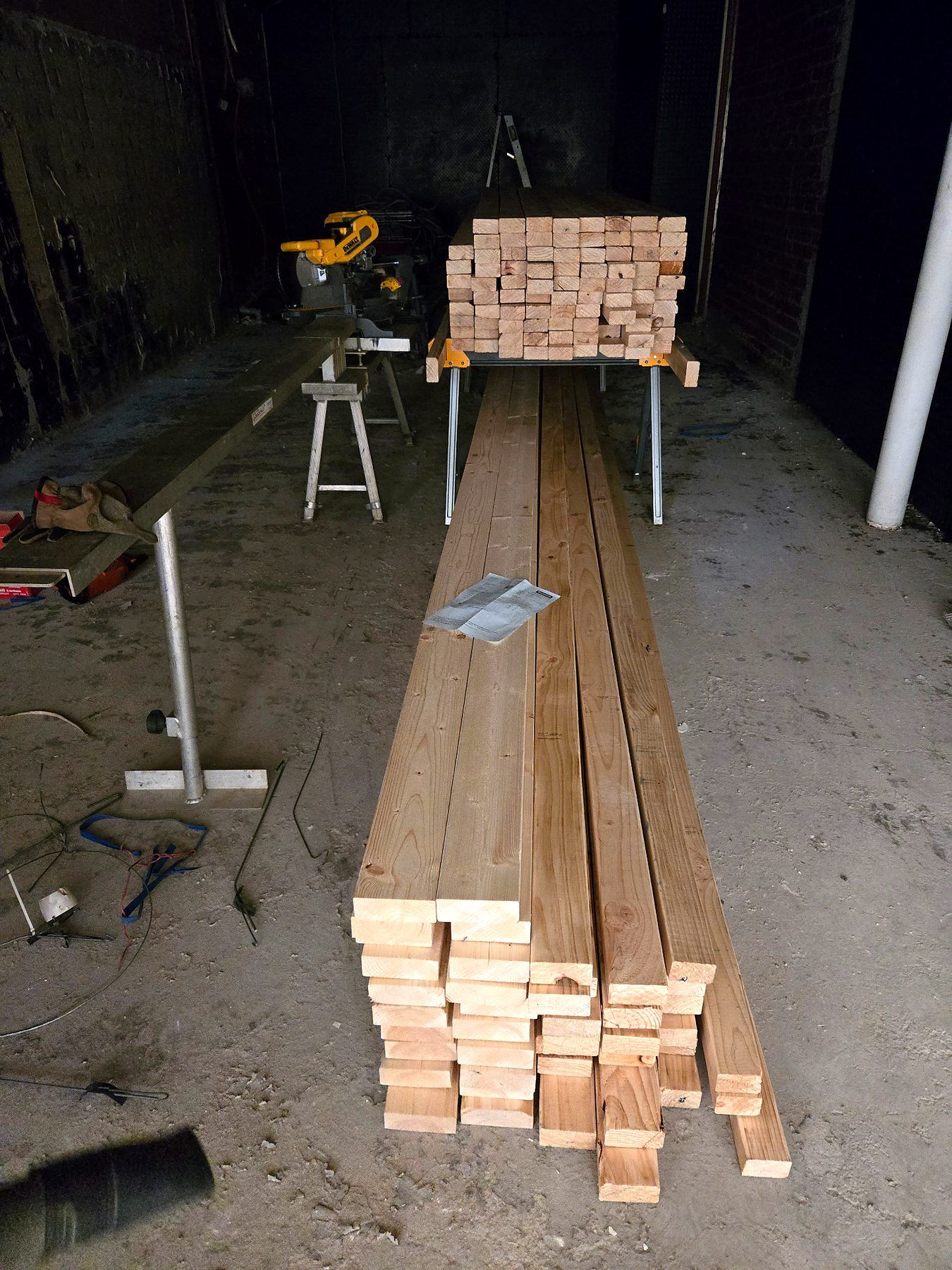 Carpentry set-up and timber stock in a stripped Coburg shop tenancy - Master Framers