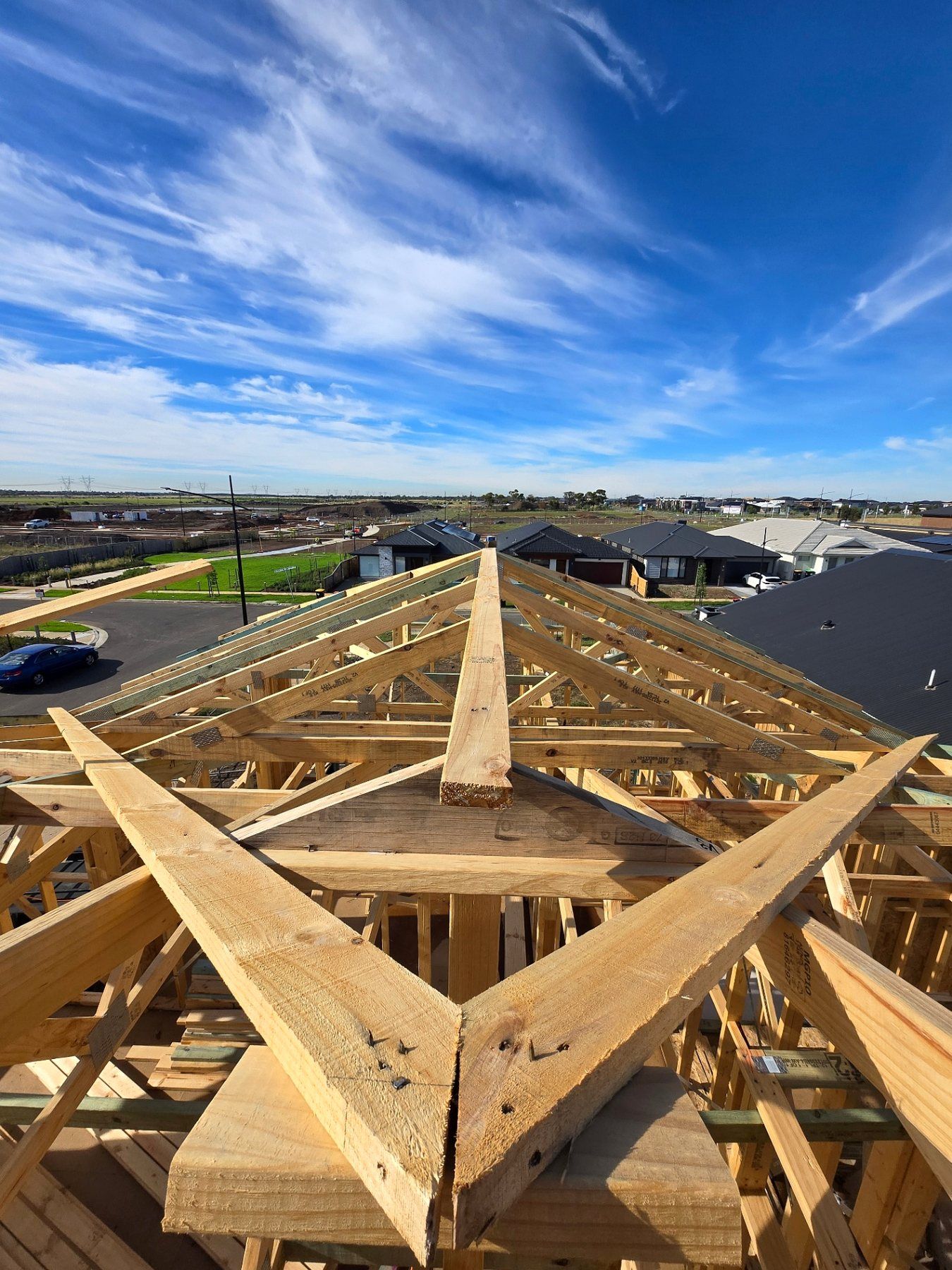 Roof trusses installed and braced on a double storey residential frame in Melbourne - Master Framers